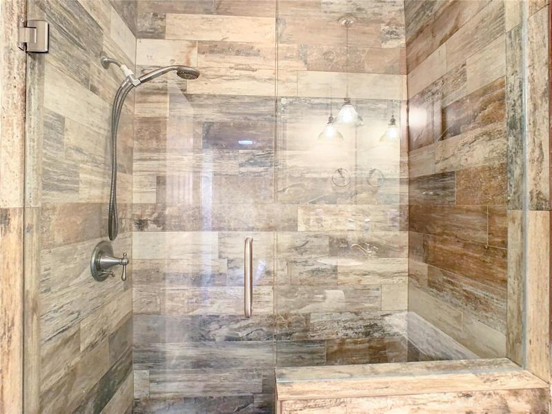 shower in full bath nearest three bedrooms