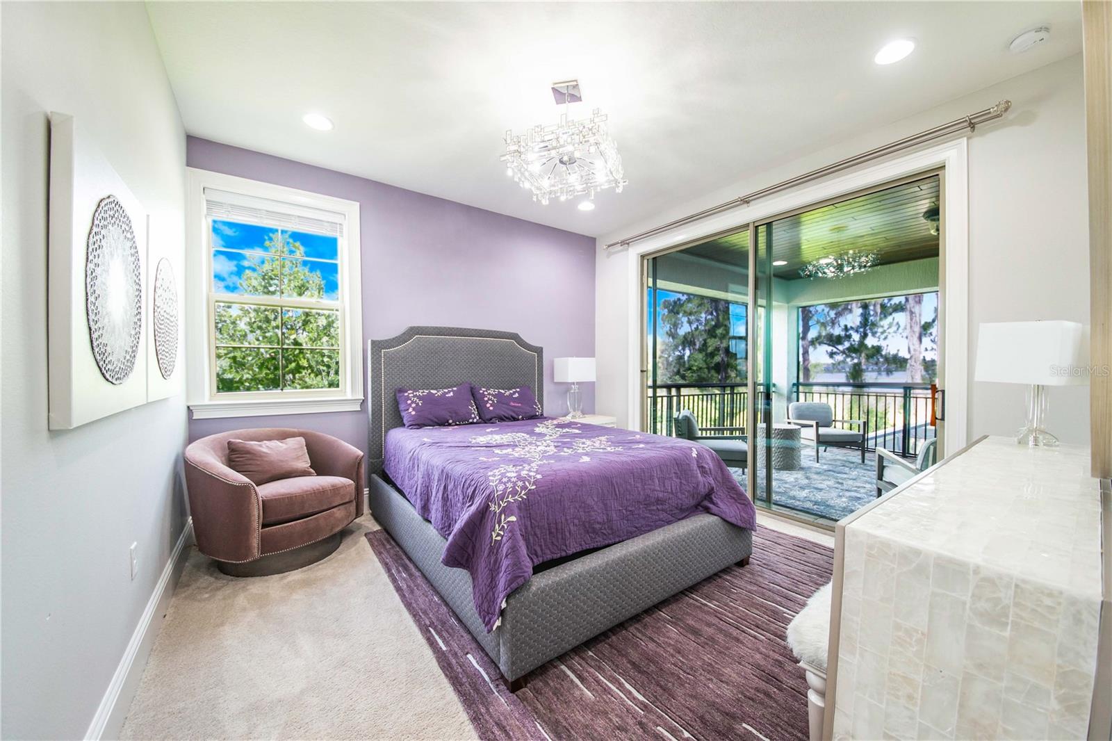 Upstairs Bedroom with Sliding doors offers Private Rear Balcony access