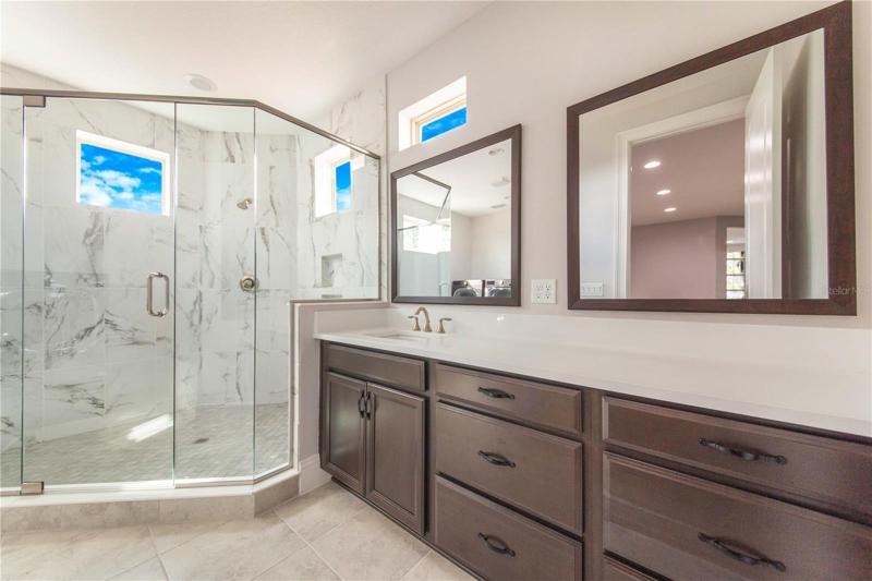 Upstairs Spare bathroom offers Huge step in Shower