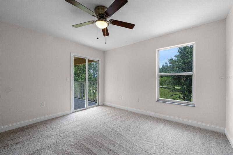 2nd floor bedroom w/ balcony access