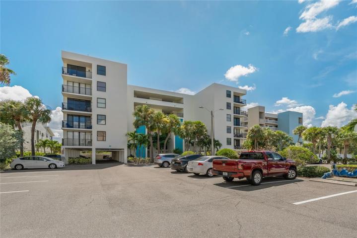 Exterior recently improved. 2 parking spaces per unit. 1 in carport & 1 in parking lot. No reserves.
