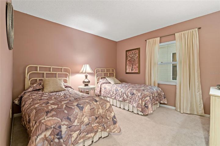 11x12 secondary bedroom w twin beds. 5x8 Main bath with tub/shower.