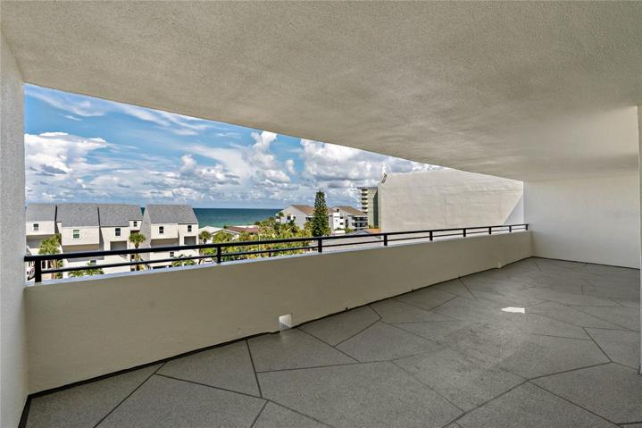 Sunset celebrations overlooking Gulf of Mexico from community patio on 5th floor.