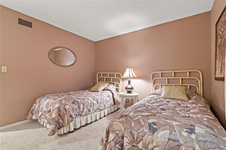 11x12 secondary bedroom w twin beds. 5x8 Main bath with tub/shower.