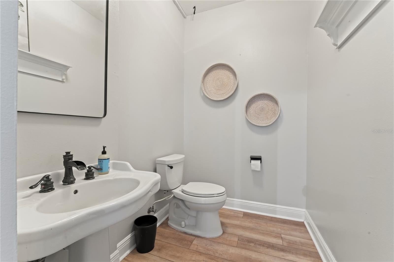 1/2 Bath off Foyer and Dining
