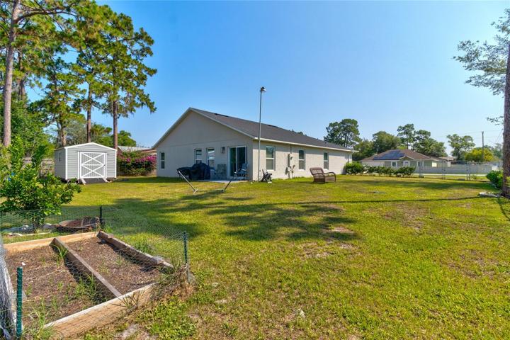 Large backyard with endless opportunities .