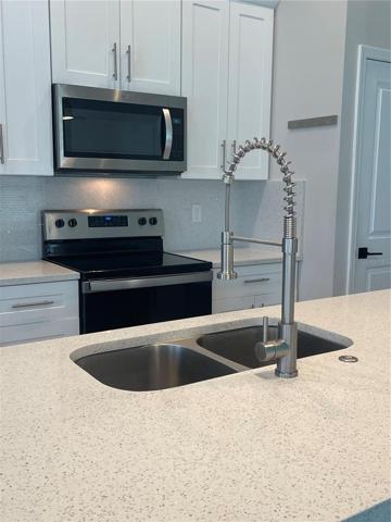 New faucet in kitchen.