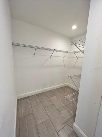 Primary walk in closet.