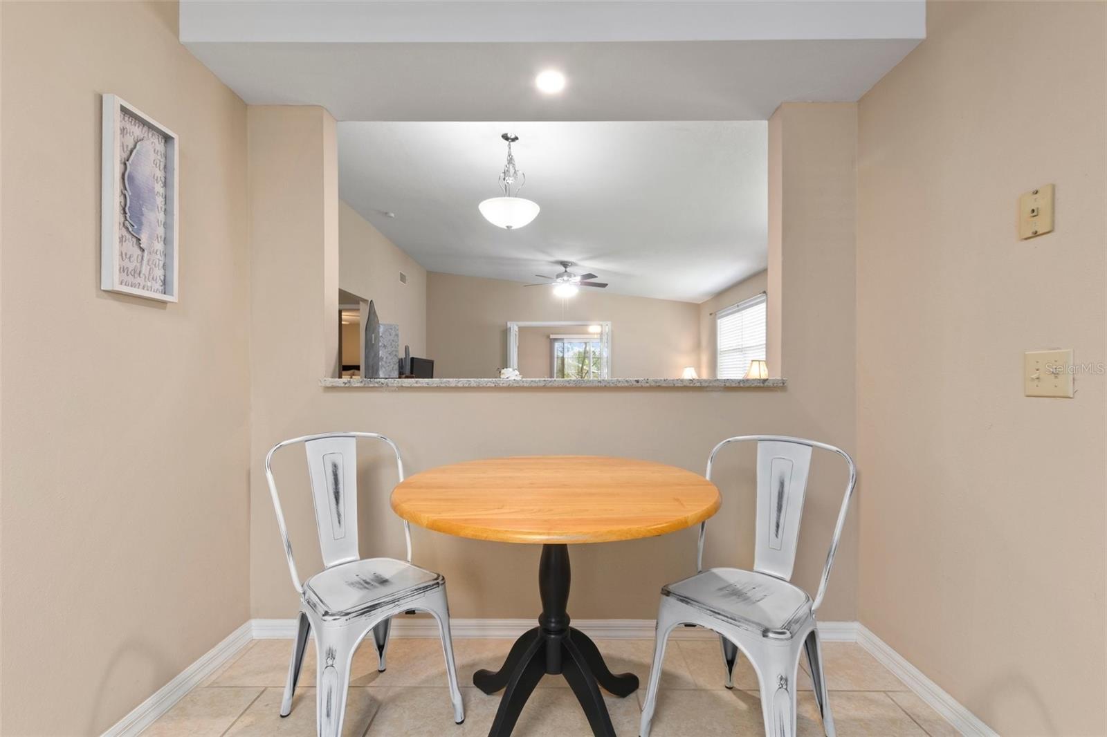 Kitchen with eat in space and passthrough