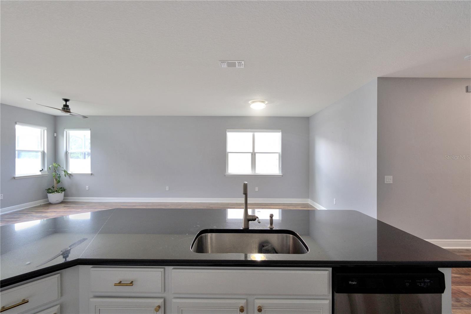 Kitchen facing living rooml