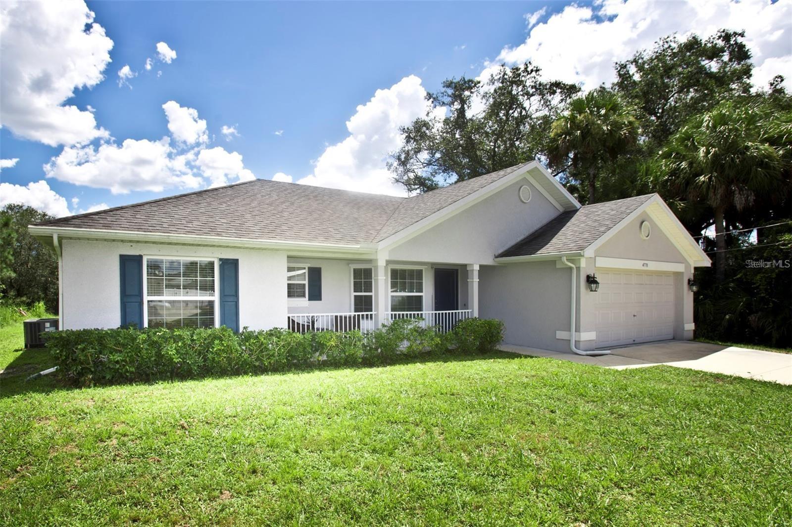 Welcome home to Lorri Circle! Split floor plan 3 bedroom, 2 bathroom home with cathedral ceilings, LED lights, stone counters. New Tangelo tree! WOW!