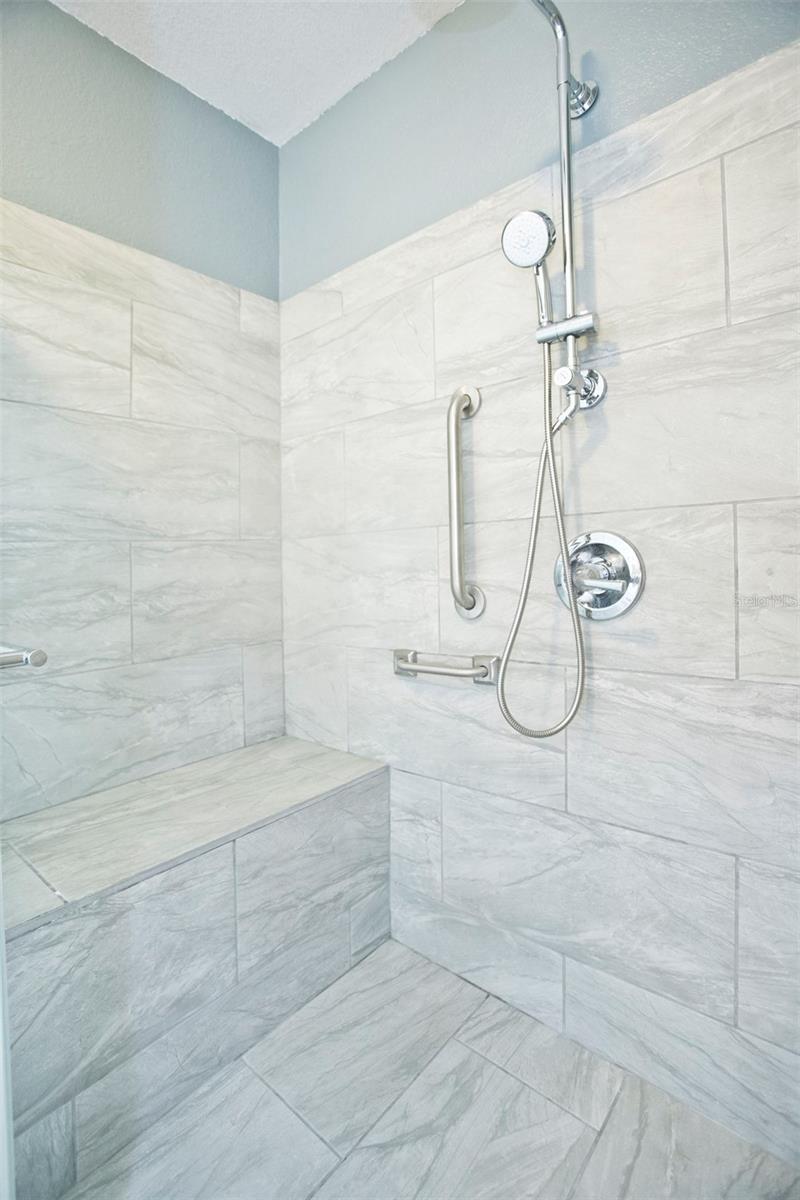 primary bath shoing newly renovated shower