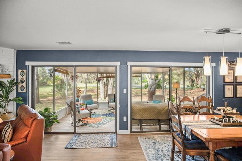 Sliders leading to screened patio