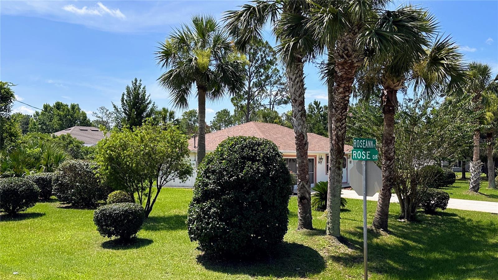 Discover the unique opportunity of owning a spacious property with a home situated in the middle of two Palm Coast lots, one of which is a coveted corner lot. This exceptional location provides you with extra privacy, ample space, and a sense of distinction. With the home strategically positioned, you'll enjoy a larger yard area, enhanced curb appeal, and the flexibility to create your own outdoor oasis.