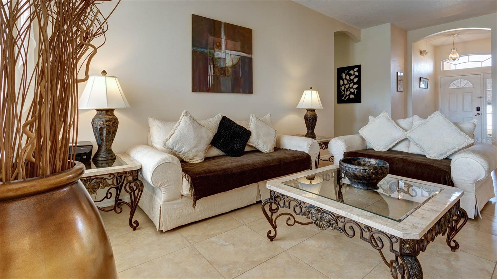 Formal living room with easy access to front door and bedrooms