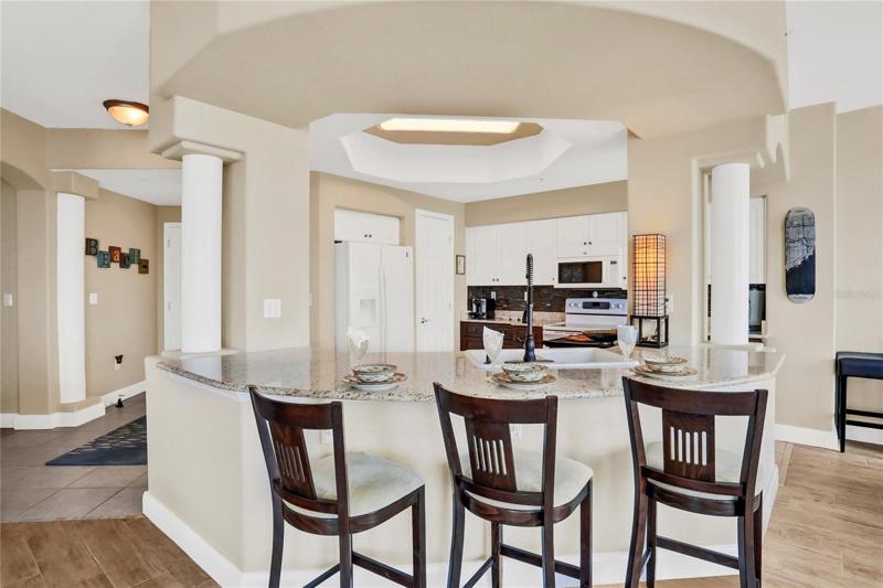 Large kitchen with granite and large island