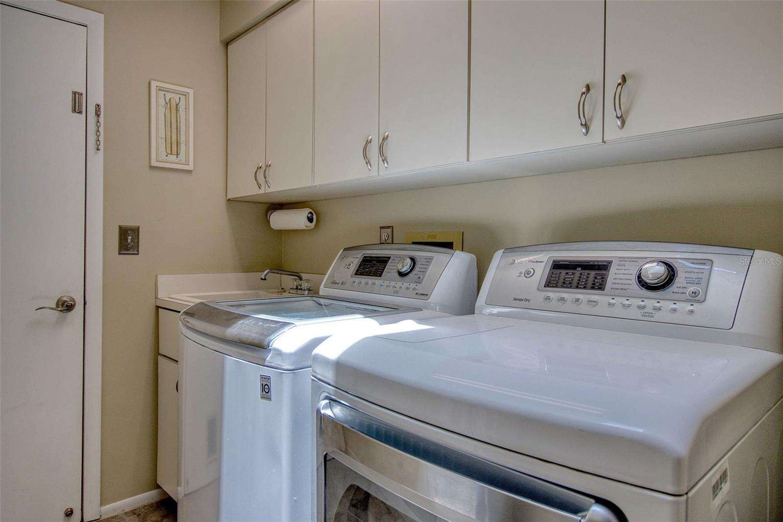 Inside laundry with utility sink.