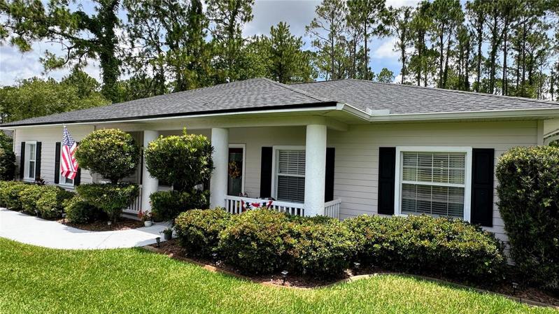 Prepare to be delighted as you approach this home, as its stunning curb appeal leaves a lasting impression. The covered porch entryway, stately columns, charming window shutters, and exquisite landscaping come together to create a truly enchanting facade that you'll be proud to call your own.
