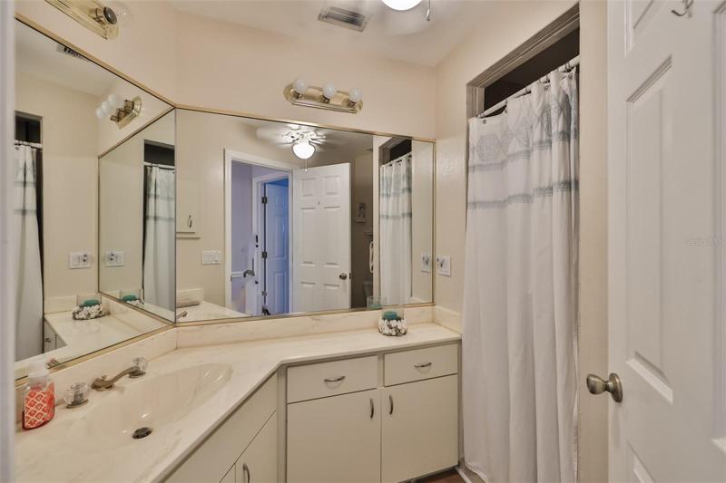 Spacious guest bathroom.