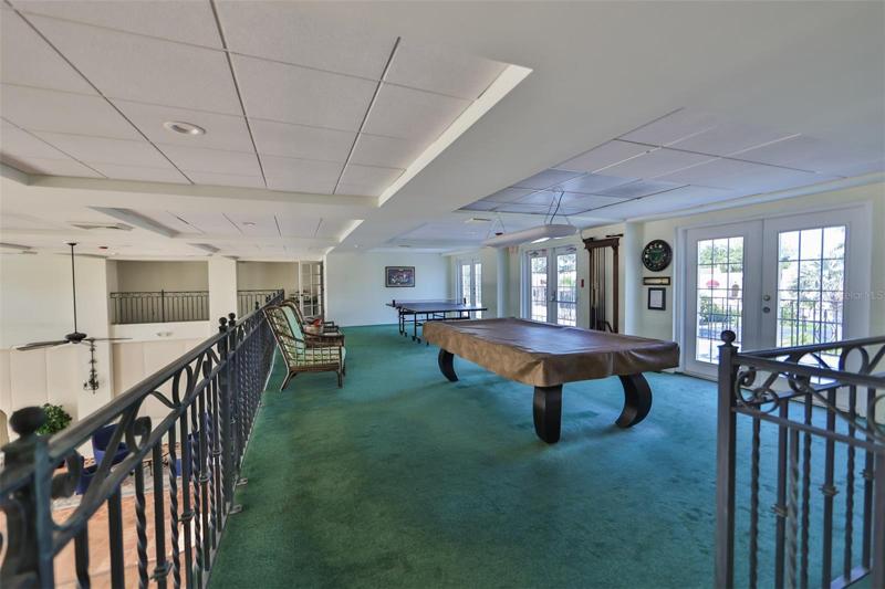 Clubhouse upstairs. (Play a game of pool or Ping-Pong.)