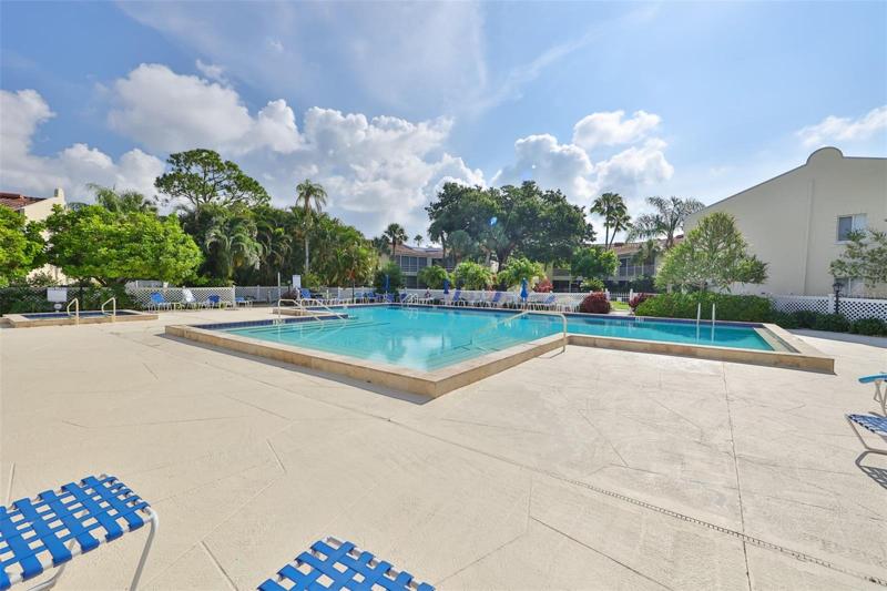 Resort size pool w/spa on left side of photo.