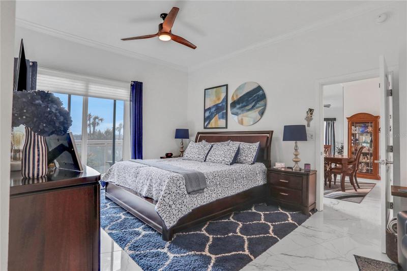 Primary bedroom with electric blinds