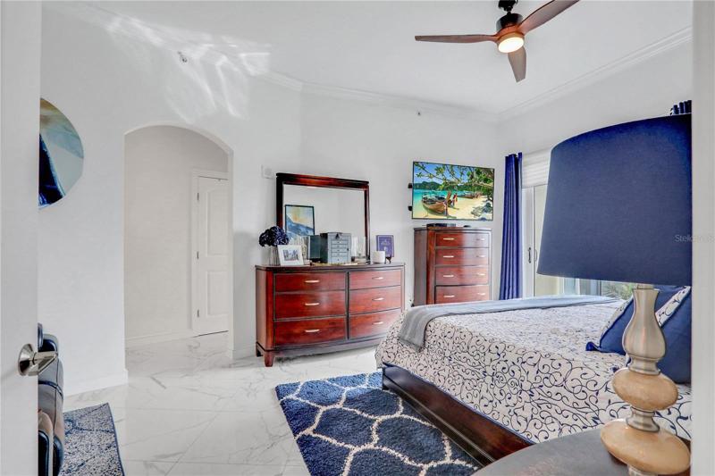 Two walk-in closets in primary bedroom
