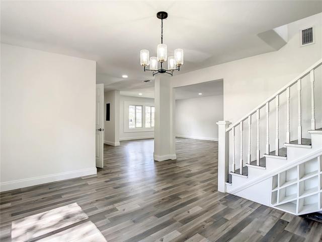 Dining / Family Room to Living Room with Under Stair Well Wine Rack