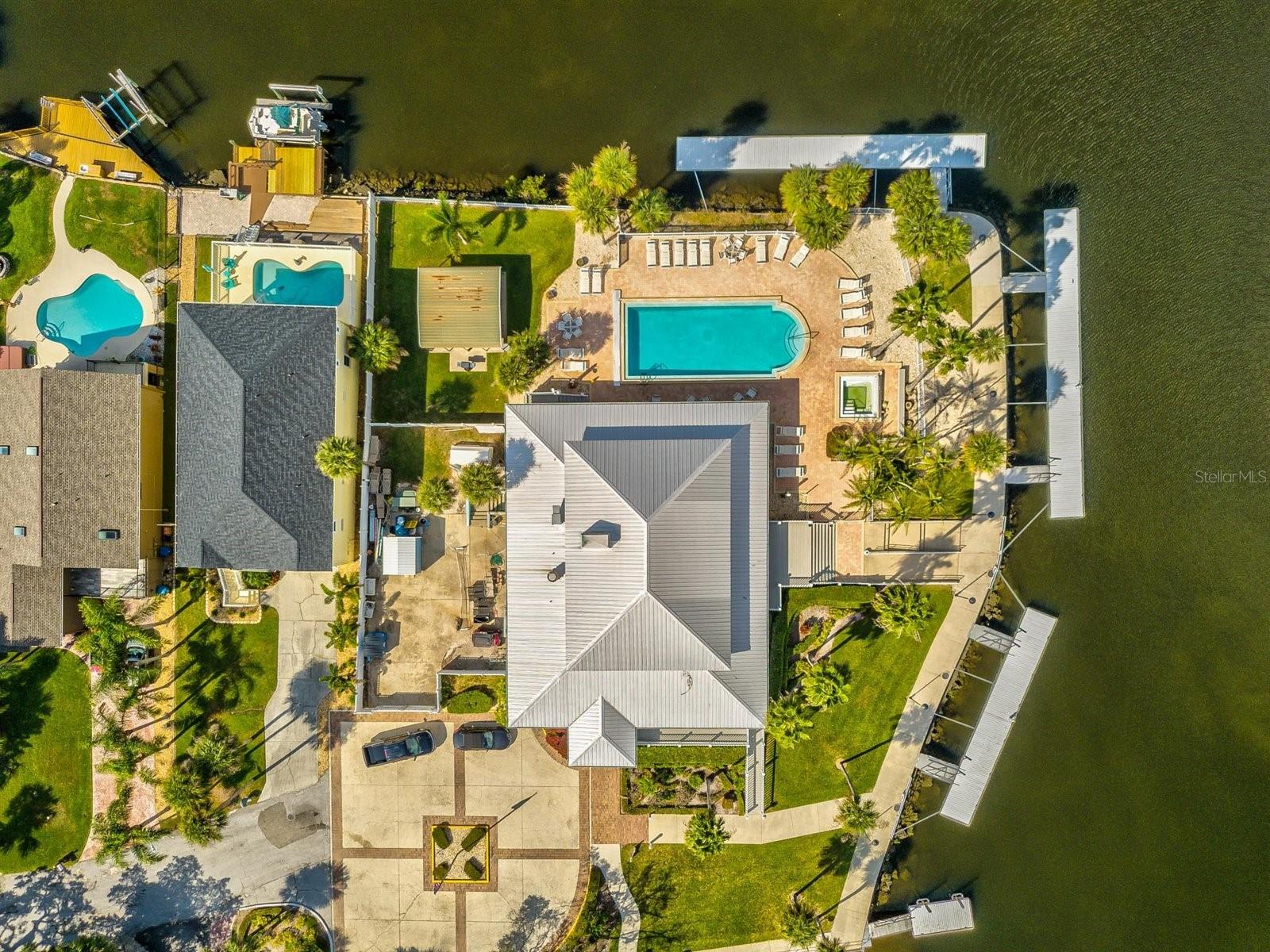 Arial view of the Clubhouse and community pool boat ramp and floating docks