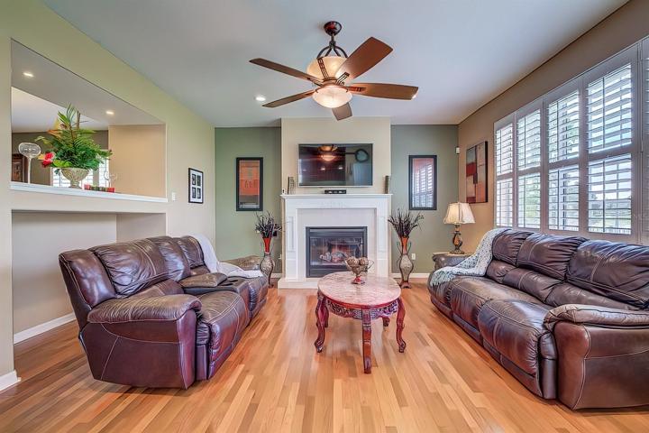 Family room with electric fireplace.