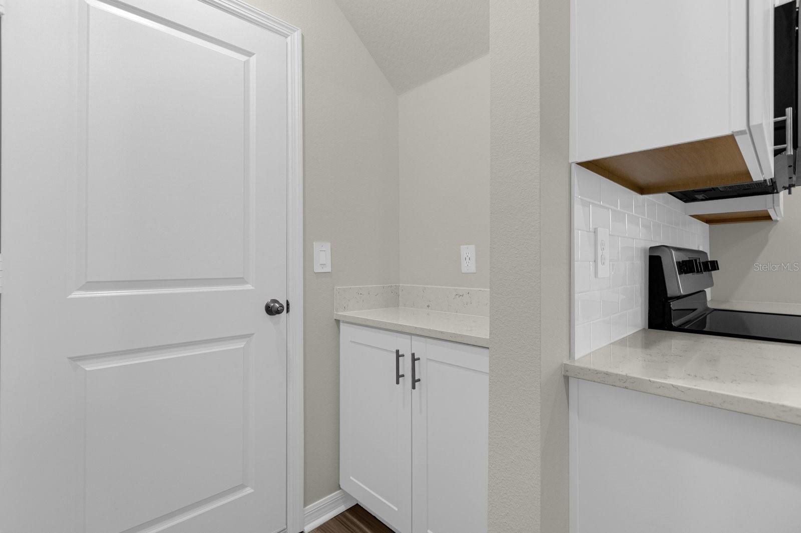 Garage entrance/Utility desk