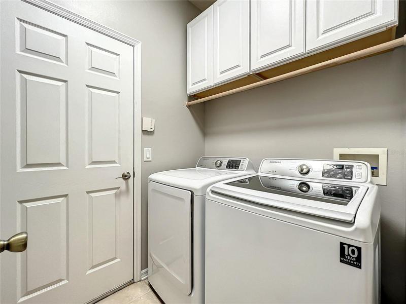 Laundry with cabinets