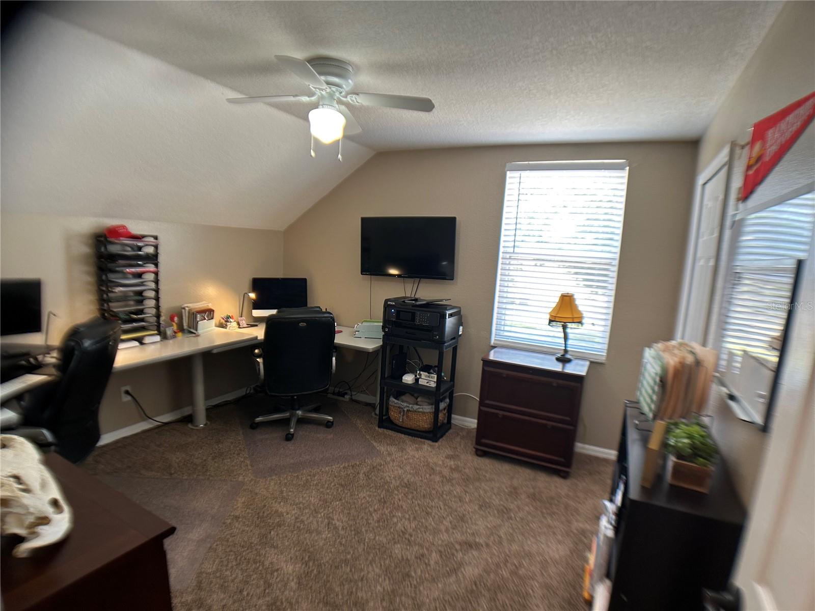 SCREENED LANAI WITH INSULATED ROOF AND CEILING FANS