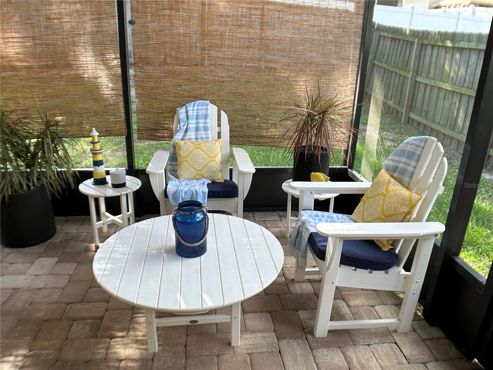 SCREENED LANAI WITH INSULATED ROOF AND CEILING FANS