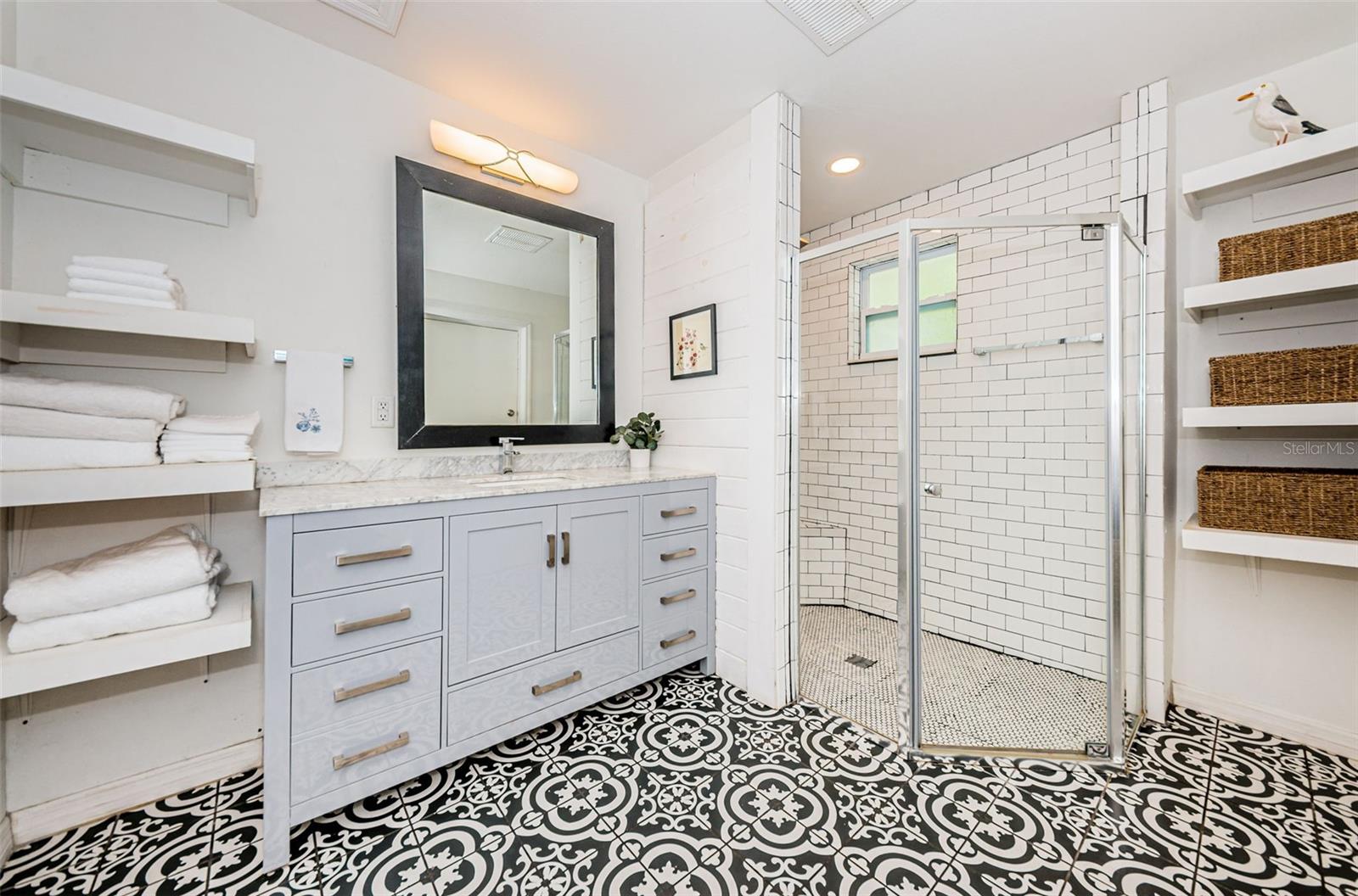 Stunning bathroom with amazing step in shower.