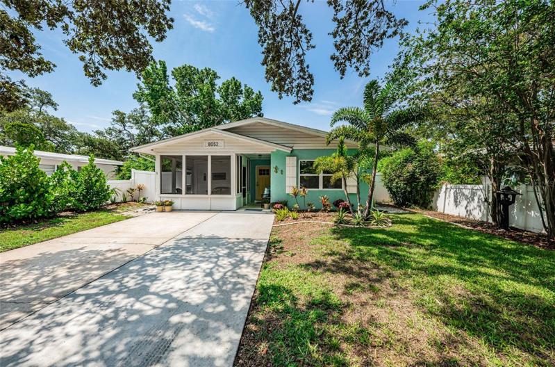 Simply charming Key West style home in the Jungle Terrace neighborhood.