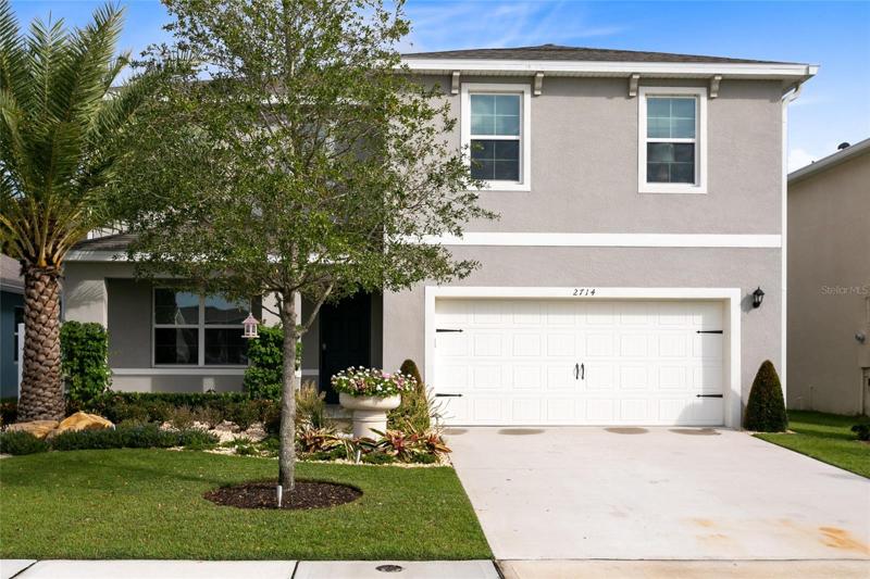 Welcome to this METICULOUSLY maintained home in the gated community of Wyndham Preserve. The beautifully landscaped front yard sets the stage for what awaits inside.