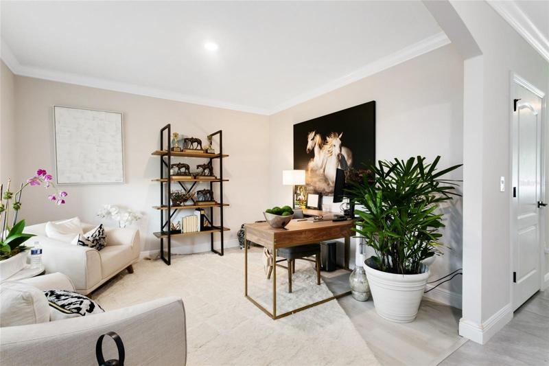 As you step into the foyer, a flex room to your left offers versatile options for a home office, formal living room, or anything that suits your needs.