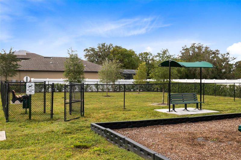 A fenced dog park for the four legged family members.