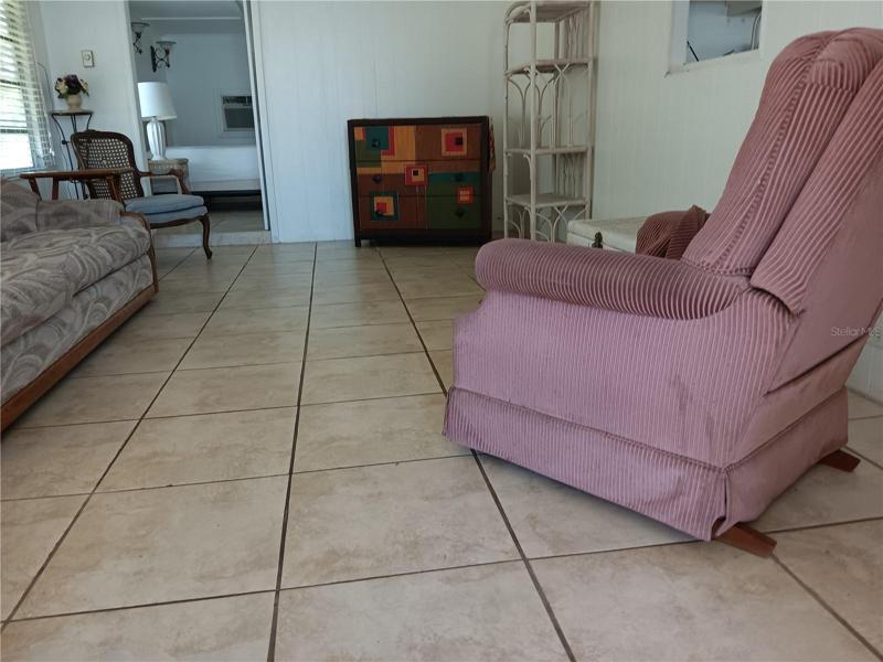 Living Room.  The safa, chair, and tables, etc. are FREE.