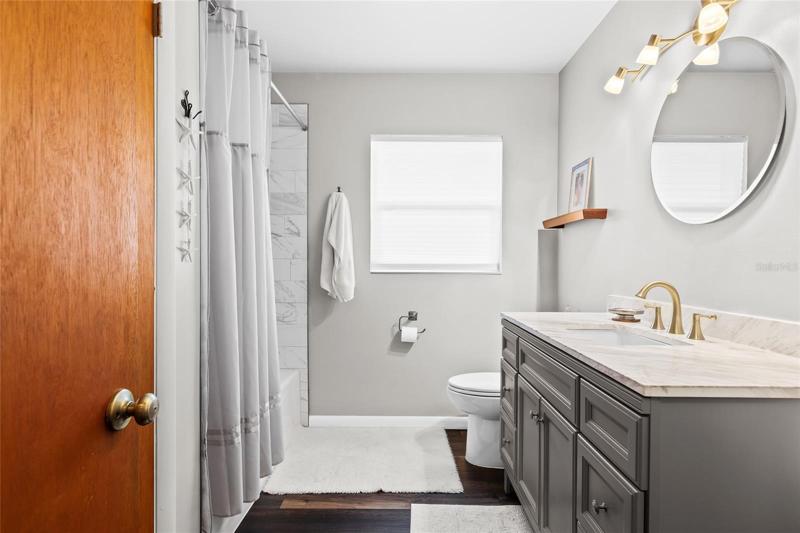 Remodeled second bath with tons of storage