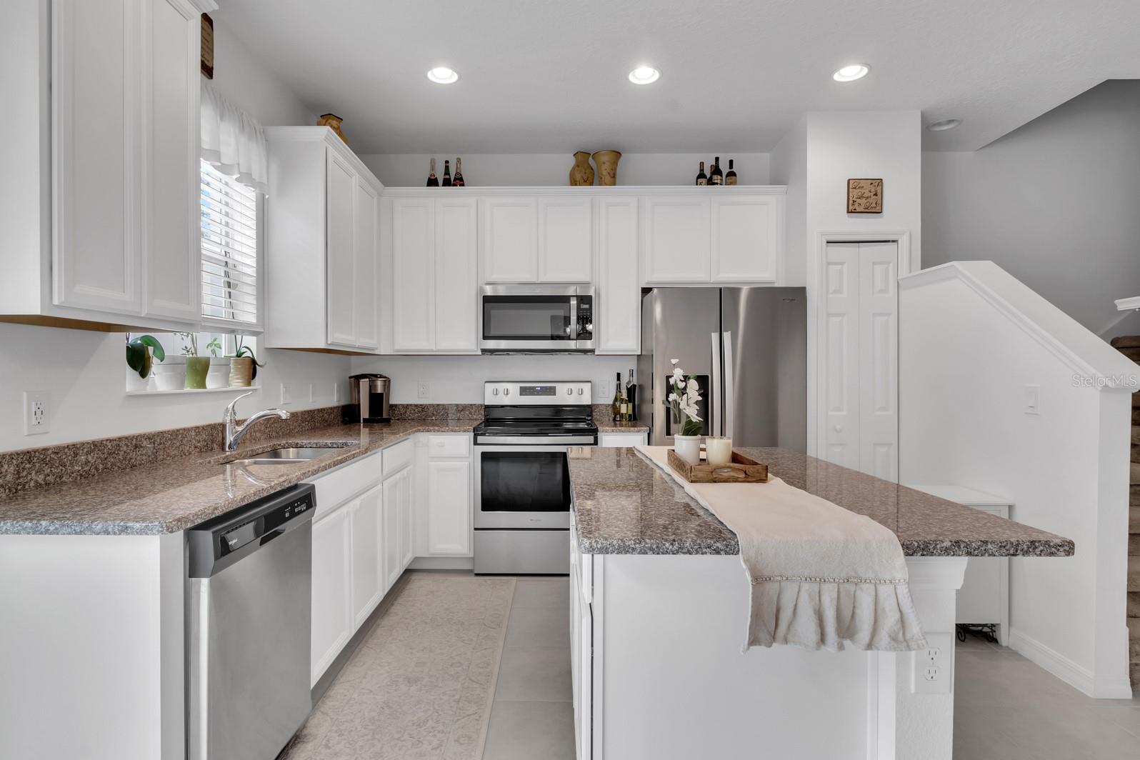 Large kitchen offers additional seating