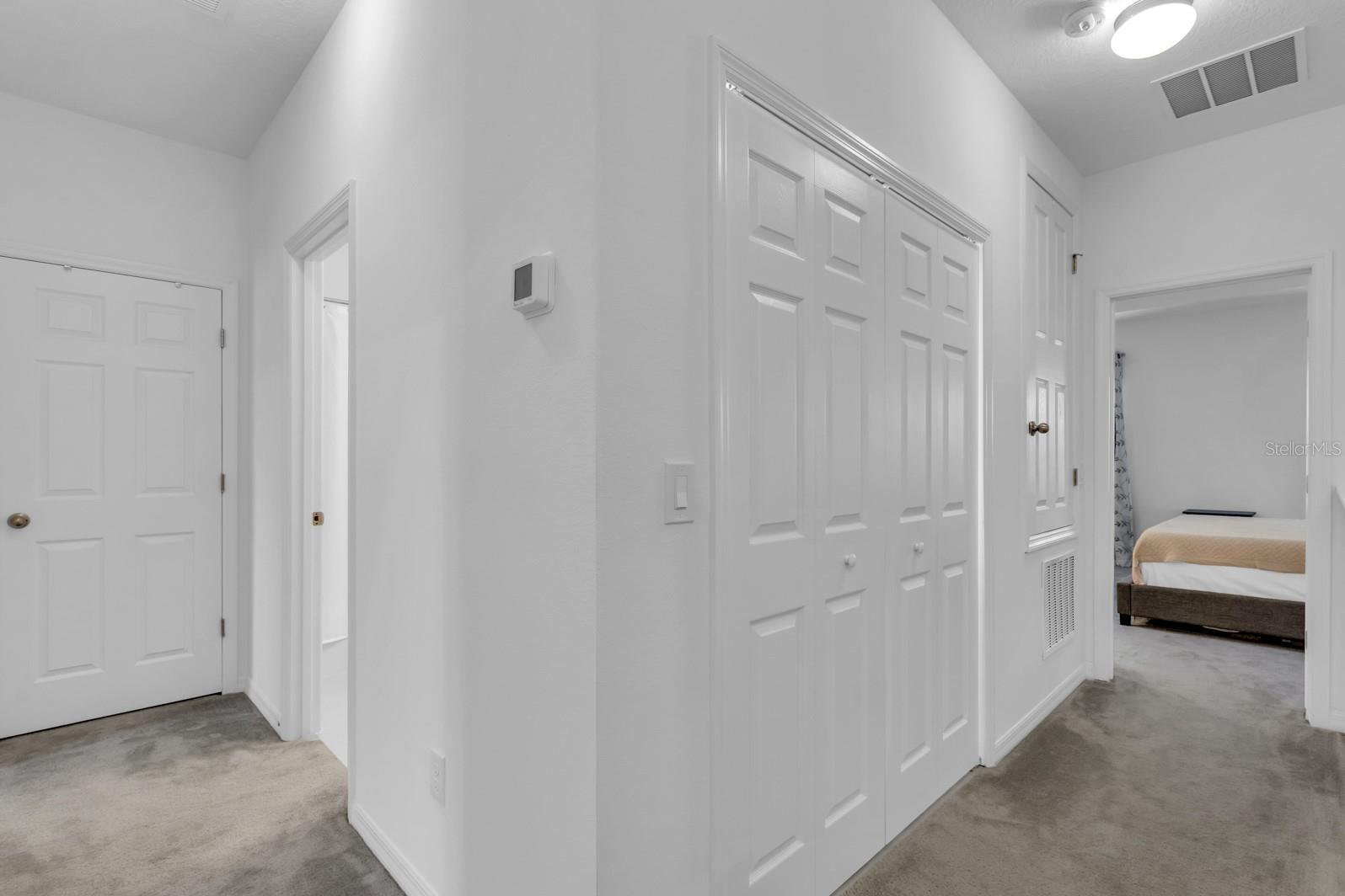Owner's suite is split from the other two bedrooms
