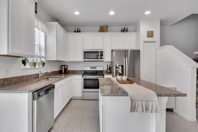 Large kitchen offers additional seating