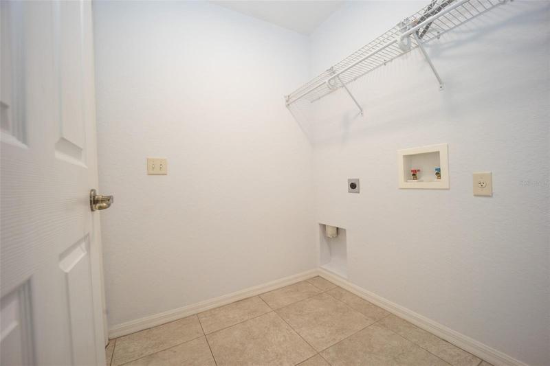 Oversize washroom with shelving