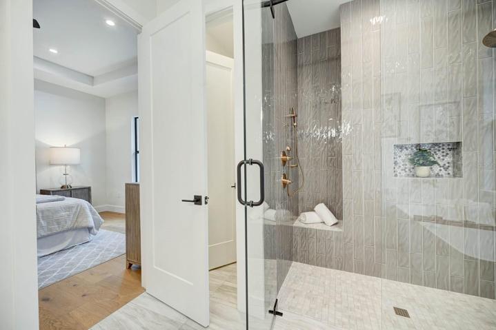 large shower with bench