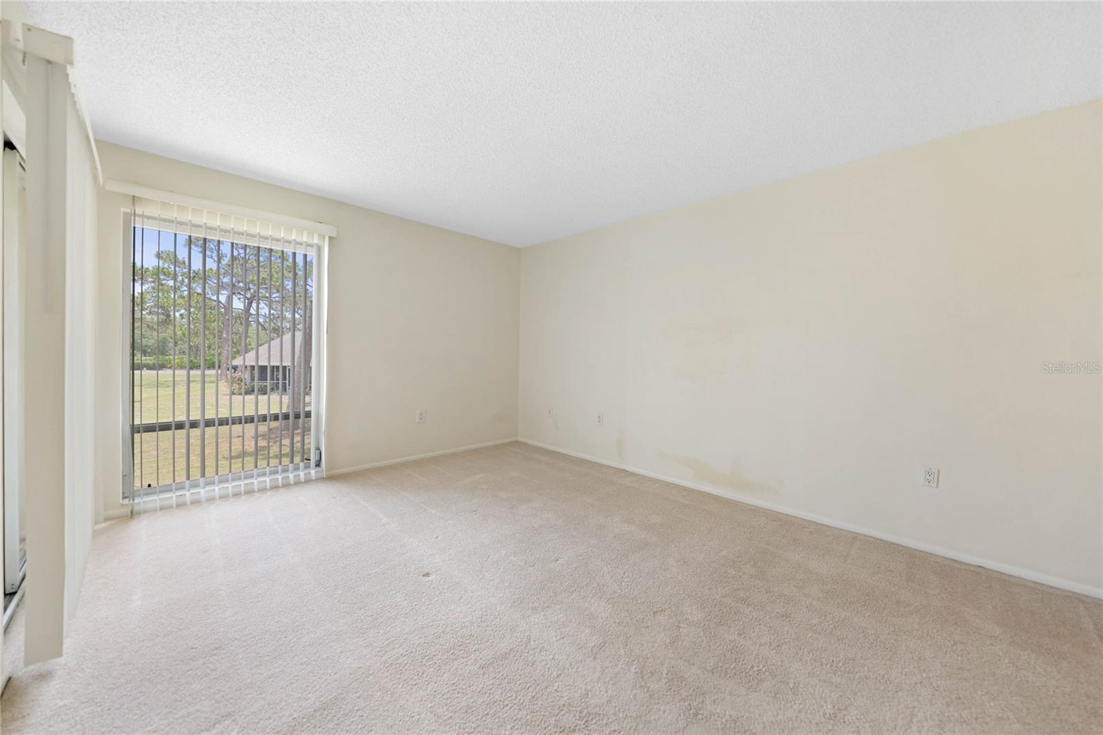 Master bedroom with sliders to lanai
