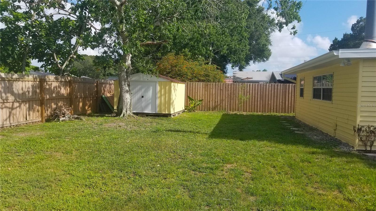 Fully fenced with storage shed