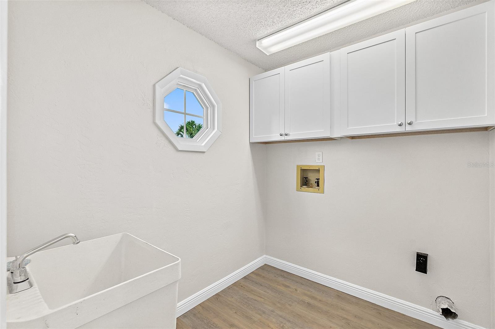 Inside Laundry Room w/ Cabinets