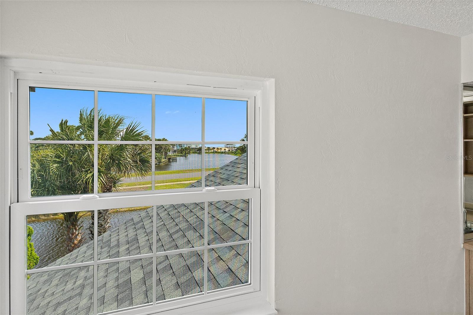 View out 4th Br window of lake